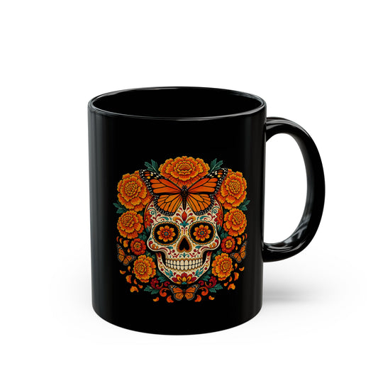 Marigold and monarch sugar skull design wrapping an 11oz black ceramic mug