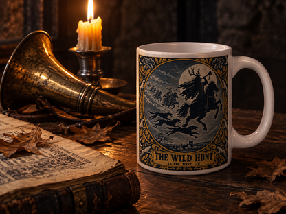 Wild Hunt mug by candlelight on a dark oak table with an antique brass hunting horn and an open old book