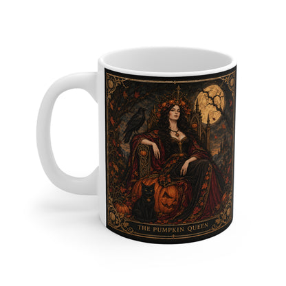 The Pumpkin Queen Halloween mug — a crowned gothic figure with a raven and a black cat beneath a harvest moon, printed on an 11oz ceramic mug
