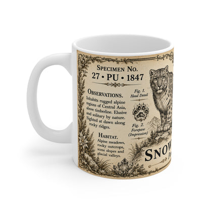 Vintage snow leopard engraving with alpine motifs and field notes on a white ceramic mug